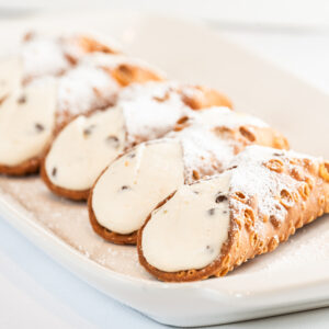 tray of classic ricotta cheese cannoli from italian bakery termini brothers